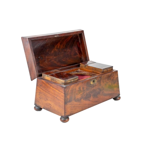 32 - An early Victorian sarcophagus shape tea caddy. Fitted with twin internal lidded compartments and a ... 