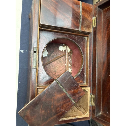 32 - An early Victorian sarcophagus shape tea caddy. Fitted with twin internal lidded compartments and a ... 