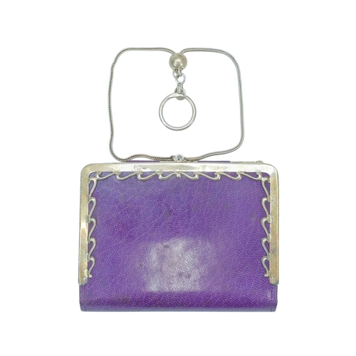 342 - A purple faux leather and sterling silver purse. Sent in 1905 by the Vanity Fair publicity departmen... 