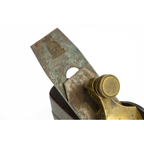 37 - A gun metal and steel smoothing plane. Coffin shape, with rosewood infil, fitted a Ward iron, length... 