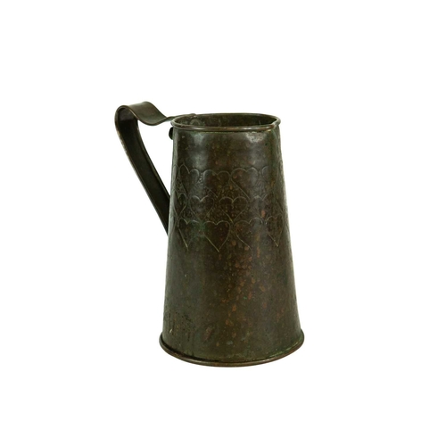 38 - An Arts and Crafts copper ale jug with repousse heart decoration. Height 21.5cm. Together with a J &... 