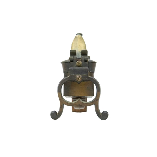 4 - A Dunhill 'Tinder Pistol' table lighter. Formed of wood and brass, the underside marked 'Made in Eng... 