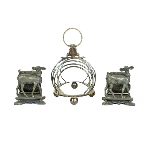 44 - A pair of Reed & Barton plated metal napkin rings. Late 19th century, cast with cherubs beside a lam... 