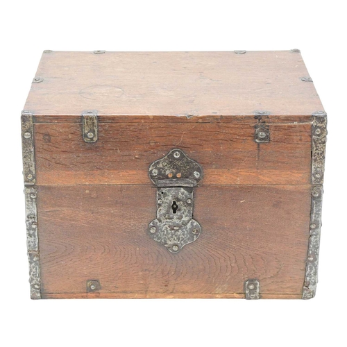 483 - A Dutch iron mounted oak ship's decanter box. 17th/early 18th century, the case with iron straps and... 