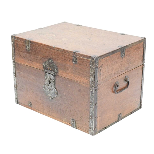 483 - A Dutch iron mounted oak ship's decanter box. 17th/early 18th century, the case with iron straps and... 