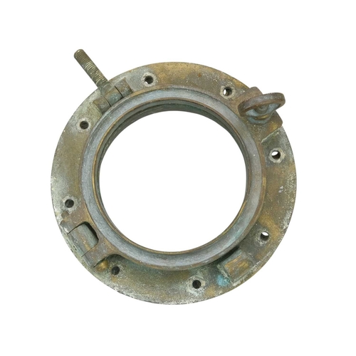 484 - A salvaged brass porthole. Diameter 29cm, no glass.