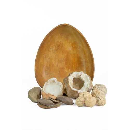 49 - A white quartz geode. Approximately 13cm diameter, another smaller, and several other similar smalle... 