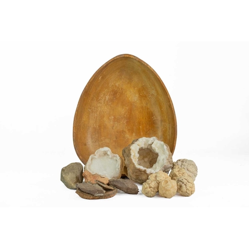 49 - A white quartz geode. Approximately 13cm diameter, another smaller, and several other similar smalle... 