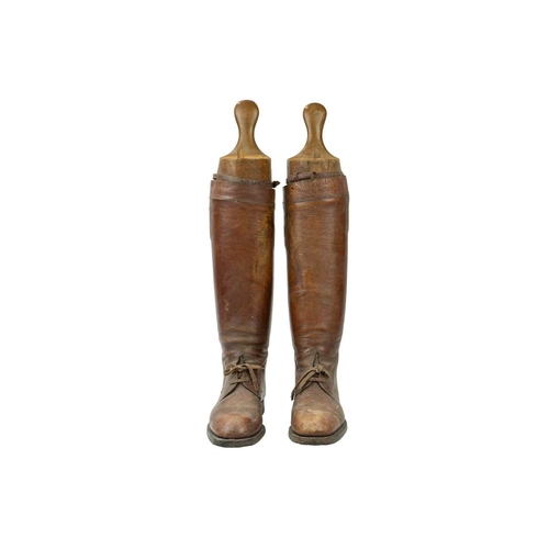 50 - A pair of brown leather military or riding boots. Early 20th century, approximate men's size 12 (UK)... 