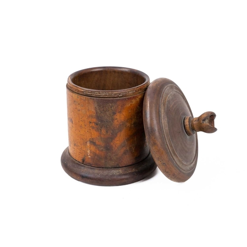 52 - A Victorian treen lignum vitae string box. The turned lid with a knop incorporating a cutting blade,... 