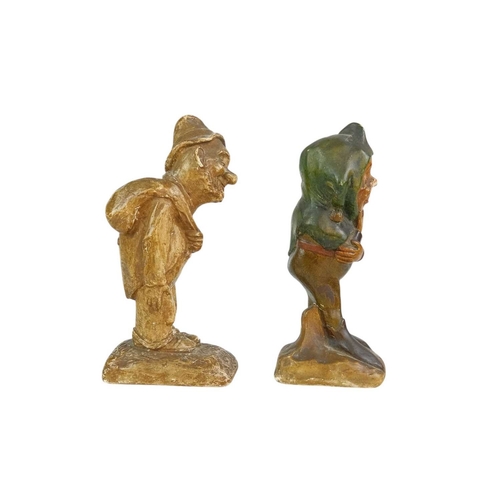 62 - Two plaster character figures. Circa 1920s, one inscribed 'Clarence', each with a pencil inscription... 