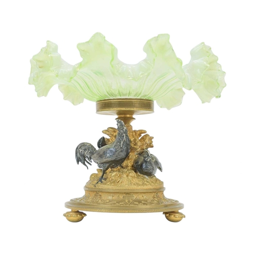 7 - A 19th century vaseline glass tazza or centrepiece on a gilt bronze and silvered stand. Witha distin... 