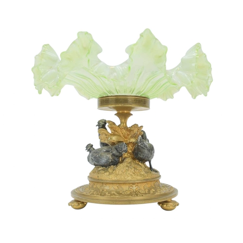 7 - A 19th century vaseline glass tazza or centrepiece on a gilt bronze and silvered stand. Witha distin... 