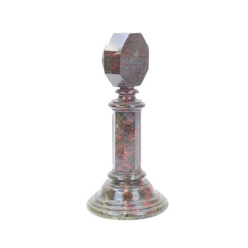 70 - A late 19th/early 20th century Cornish serpentine desk barometer. The octagonal case raised on facet... 