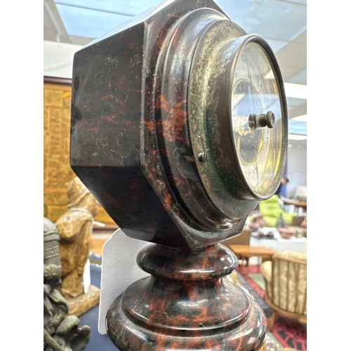 70 - A late 19th/early 20th century Cornish serpentine desk barometer. The octagonal case raised on facet... 