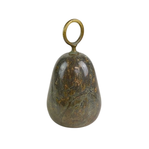 74 - A Cornish serpentine door stop with brass loop handle. Height 18cm.
