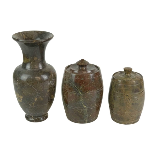 79 - A turned red Cornish serpentine tobacco jar. Height 18cm. Together with another similar, height 16cm... 