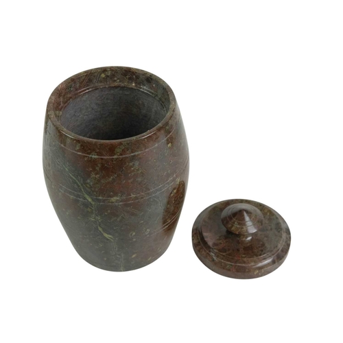 79 - A turned red Cornish serpentine tobacco jar. Height 18cm. Together with another similar, height 16cm... 