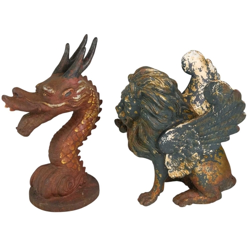 81 - A cast iron winged lion. 19th century, the mythical creature depicted seated with one raised paw, 31... 