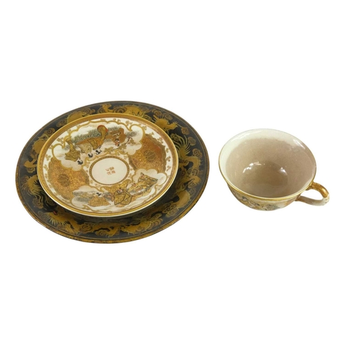 322 - A fine quality Japanese Satsuma small cup and saucer. Painted and gilt with figures in gardens, char... 