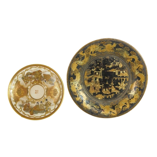 322 - A fine quality Japanese Satsuma small cup and saucer. Painted and gilt with figures in gardens, char... 
