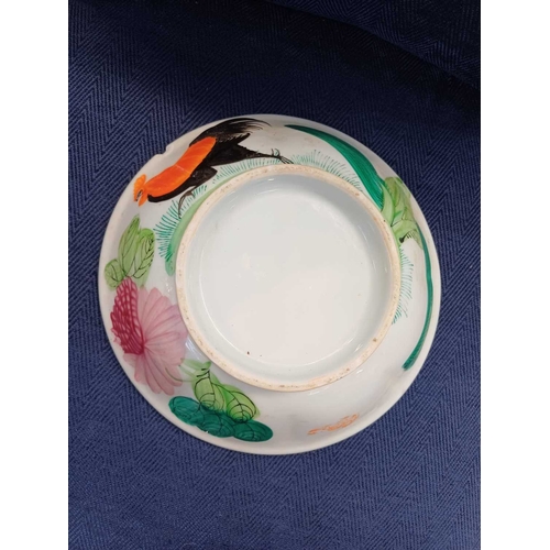360 - A Chinese millefleur porcelain plate. Qianlong mark, but 20th century, painted in polychrome enamels... 