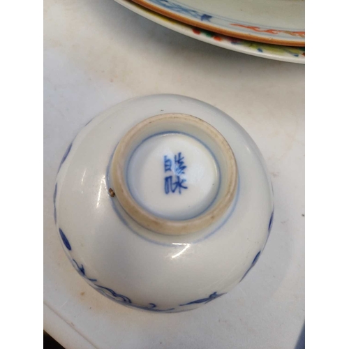 360 - A Chinese millefleur porcelain plate. Qianlong mark, but 20th century, painted in polychrome enamels... 