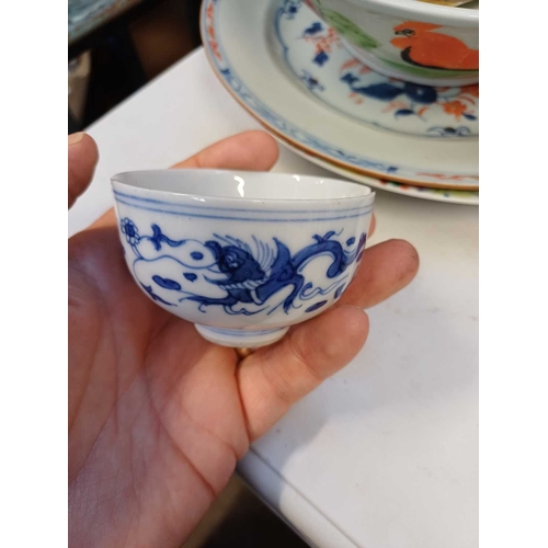 360 - A Chinese millefleur porcelain plate. Qianlong mark, but 20th century, painted in polychrome enamels... 