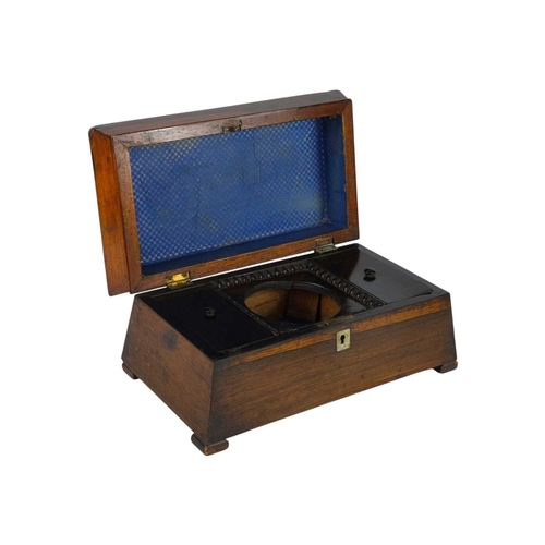 182 - A partridge wood tea caddy of sarcophagus form. 19th century, the hinged lid revealing a twin compar... 