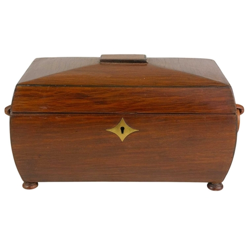 182 - A partridge wood tea caddy of sarcophagus form. 19th century, the hinged lid revealing a twin compar... 
