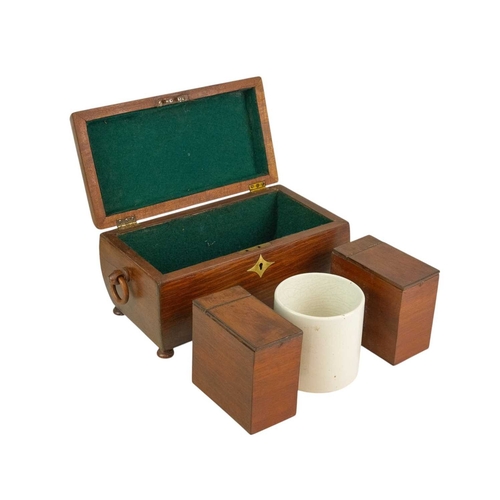 182 - A partridge wood tea caddy of sarcophagus form. 19th century, the hinged lid revealing a twin compar... 