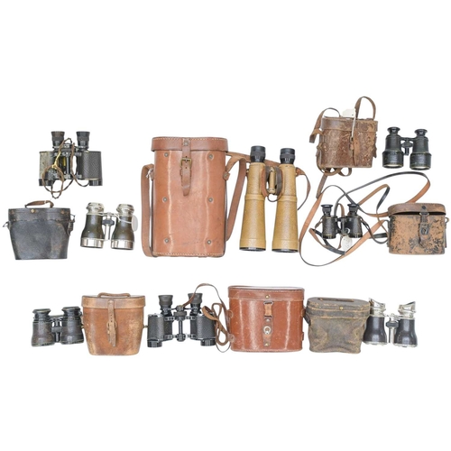 192 - German Dienstglas 10x50 tropical binoculars. With a tan applied finish marked bmj and numbered, cont... 