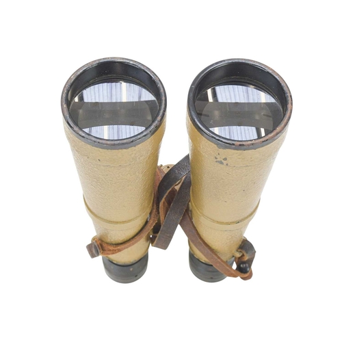 192 - German Dienstglas 10x50 tropical binoculars. With a tan applied finish marked bmj and numbered, cont... 