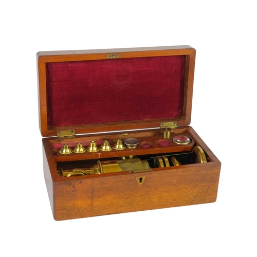 194 - A lacquered brass compound monocular drum microscope, 19th century, with rack and pinion focusing, n... 