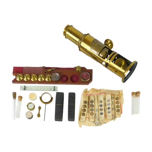 194 - A lacquered brass compound monocular drum microscope, 19th century, with rack and pinion focusing, n... 