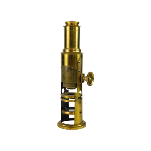 194 - A lacquered brass compound monocular drum microscope, 19th century, with rack and pinion focusing, n... 