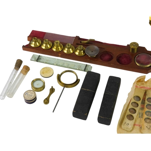 194 - A lacquered brass compound monocular drum microscope, 19th century, with rack and pinion focusing, n... 