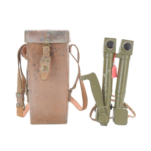 199 - A pair of WW2 German 8x24 Decigrades binoculars. Stamped M.G. SRPI No. 13122, field green paint fini... 