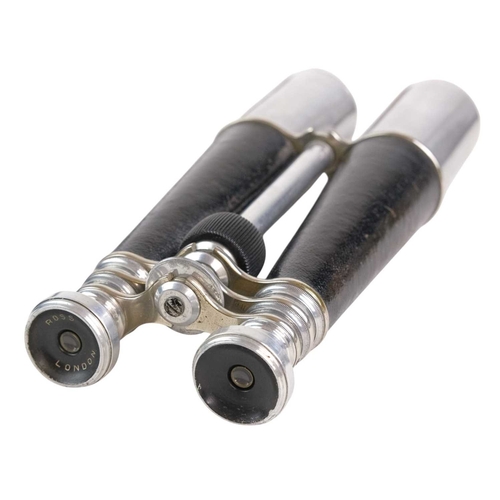 203 - A pair of Ross, London aluminium and leather marine binoculars. Early 20th century, numbered 3 1496,... 