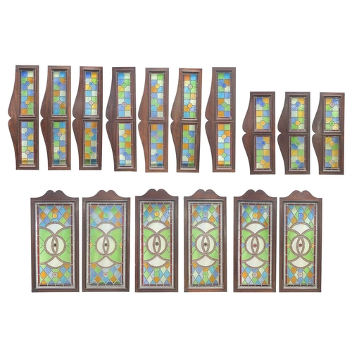 206 - A group of six stained glass panels and ten similar room divider top mounts. Mid-late 20th century, ... 