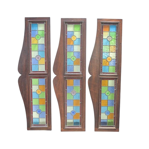 206 - A group of six stained glass panels and ten similar room divider top mounts. Mid-late 20th century, ... 
