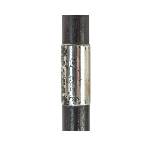 209 - An ebony long swagger stick. Banded in hallmarked silver, with rubbed markings, inscribed 'H.K. Boyl... 