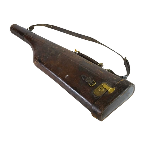 213 - A leather leg of mutton shotgun case. 20th century, length 80cm.