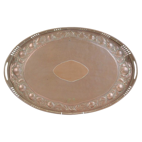 220 - A Newlyn oval galleried copper tray. With twin handles and pierced sides, with a broad border of med... 
