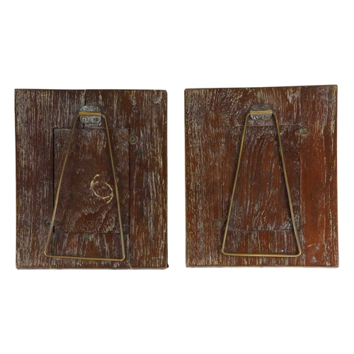 221 - A pair of Arts and Crafts copper photograph frames. Repousse decorated with trailing ivy foliage on ... 
