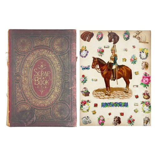 227 - A Victorian scrapbook. Three quarters full with lithographic printed scraps and postacrds, including... 