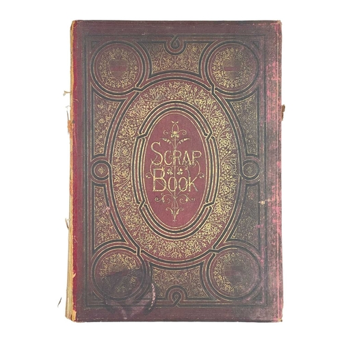 227 - A Victorian scrapbook. Three quarters full with lithographic printed scraps and postacrds, including... 
