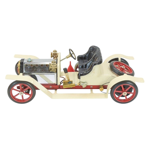 278 - A Mamod Steam Roadster, boxed. SA1, in cream with red trim, with original box.
