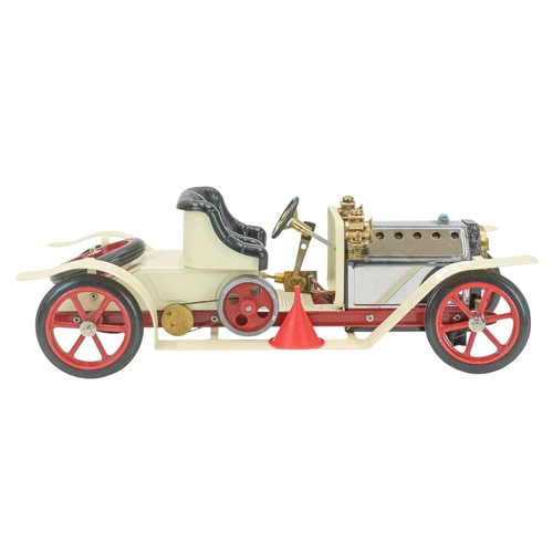 278 - A Mamod Steam Roadster, boxed. SA1, in cream with red trim, with original box.