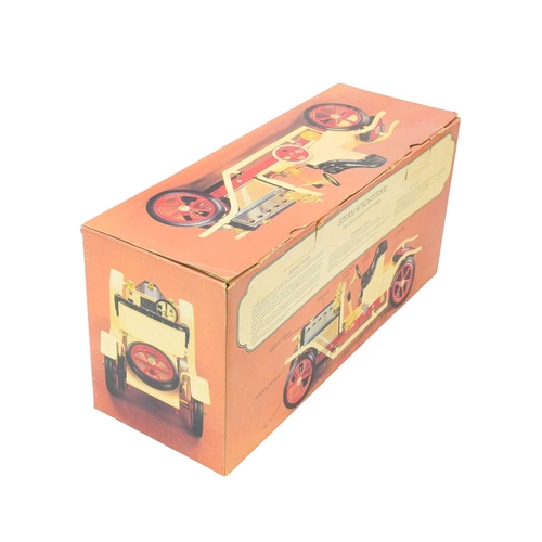 278 - A Mamod Steam Roadster, boxed. SA1, in cream with red trim, with original box.